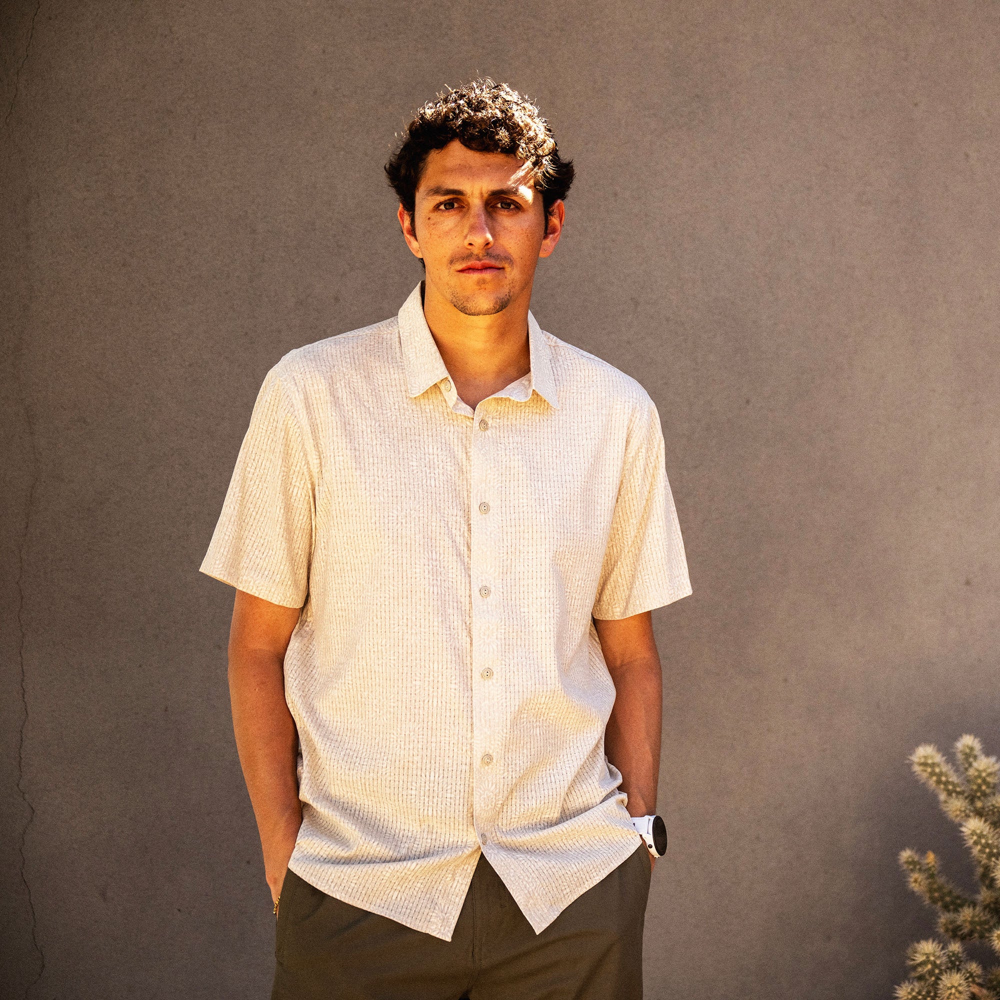 Bless Up Breathable Stretch Shirt in Sand, worn by a model outdoors, front view