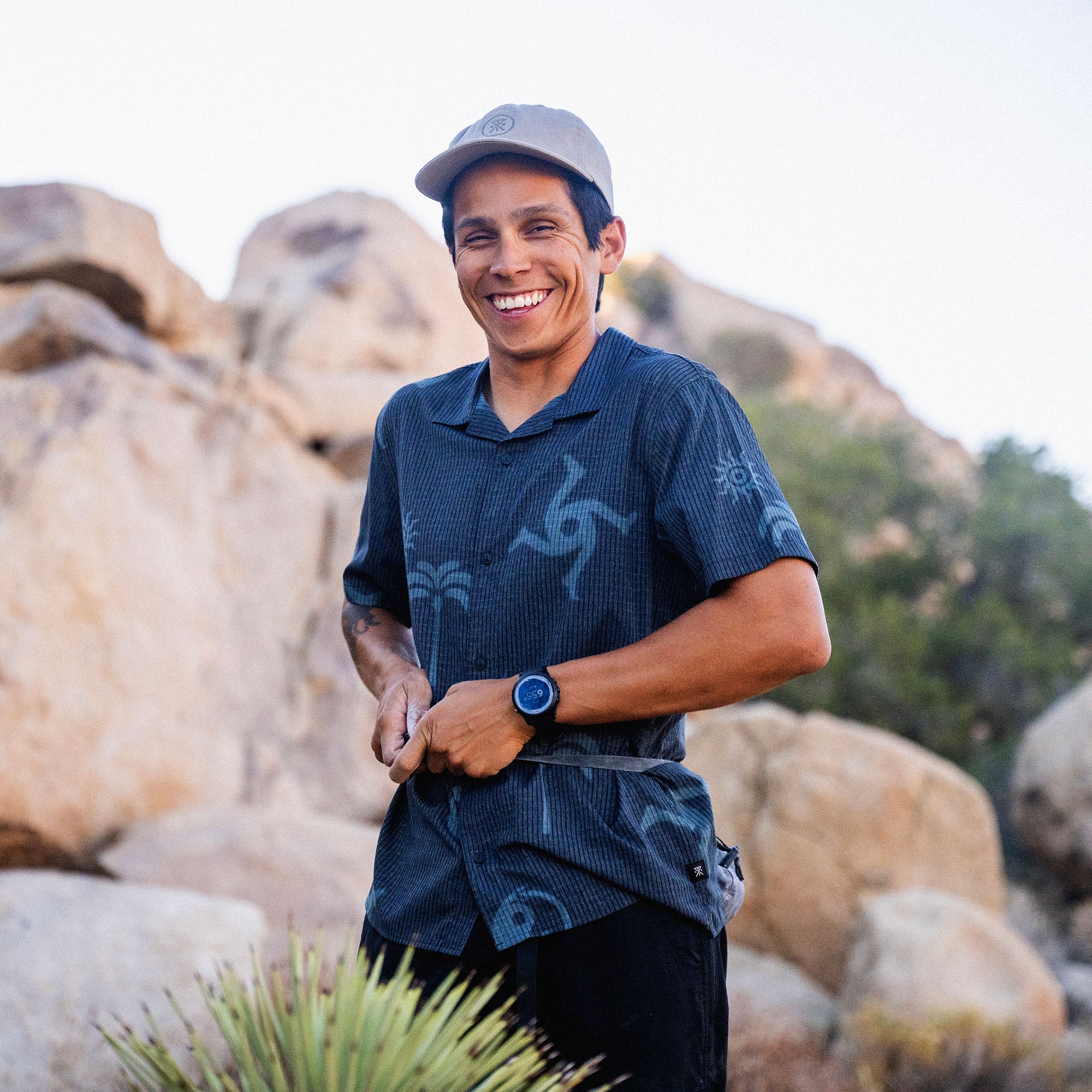 Bless Up Trail Button Up Shirt, worn by a model outdoors in a desert landscape, front view