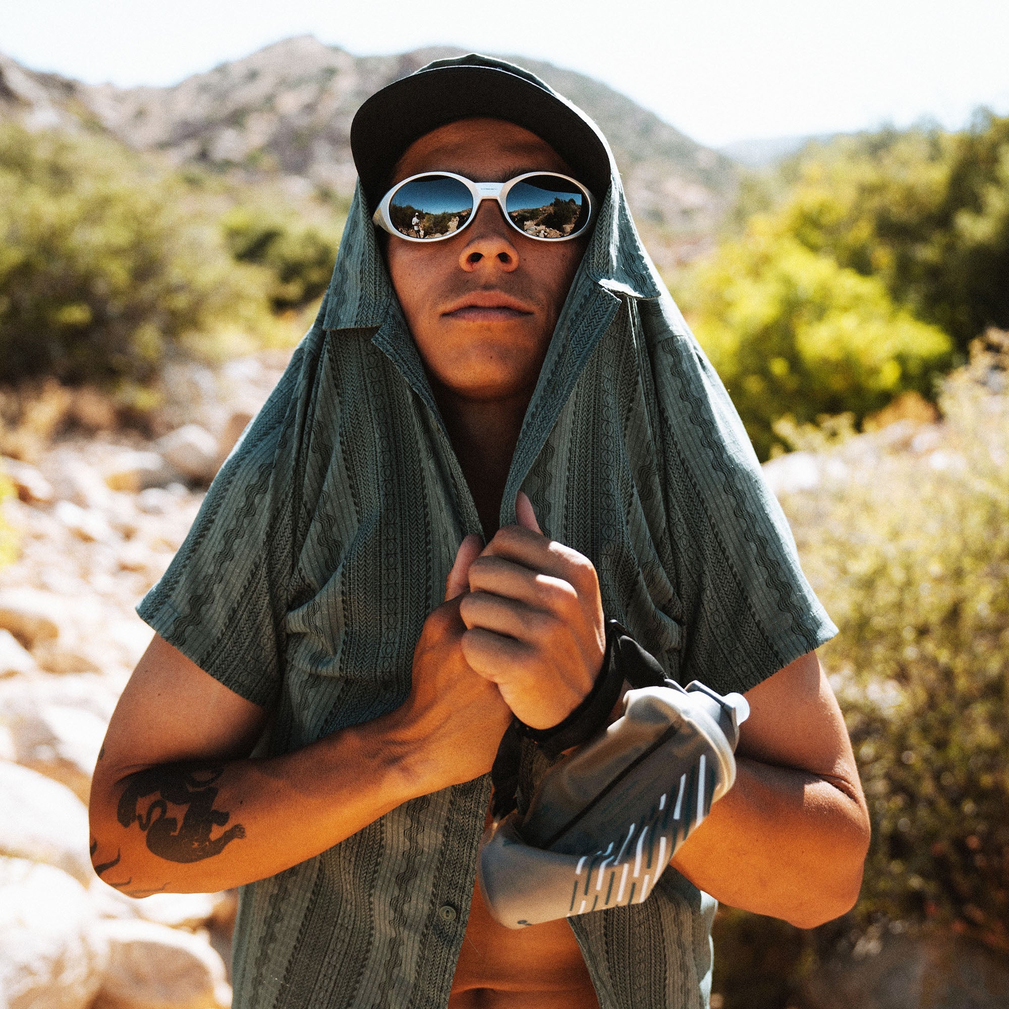 Bless Up Trail Button Up Shirt, worn by a model in a desert mountain landscape