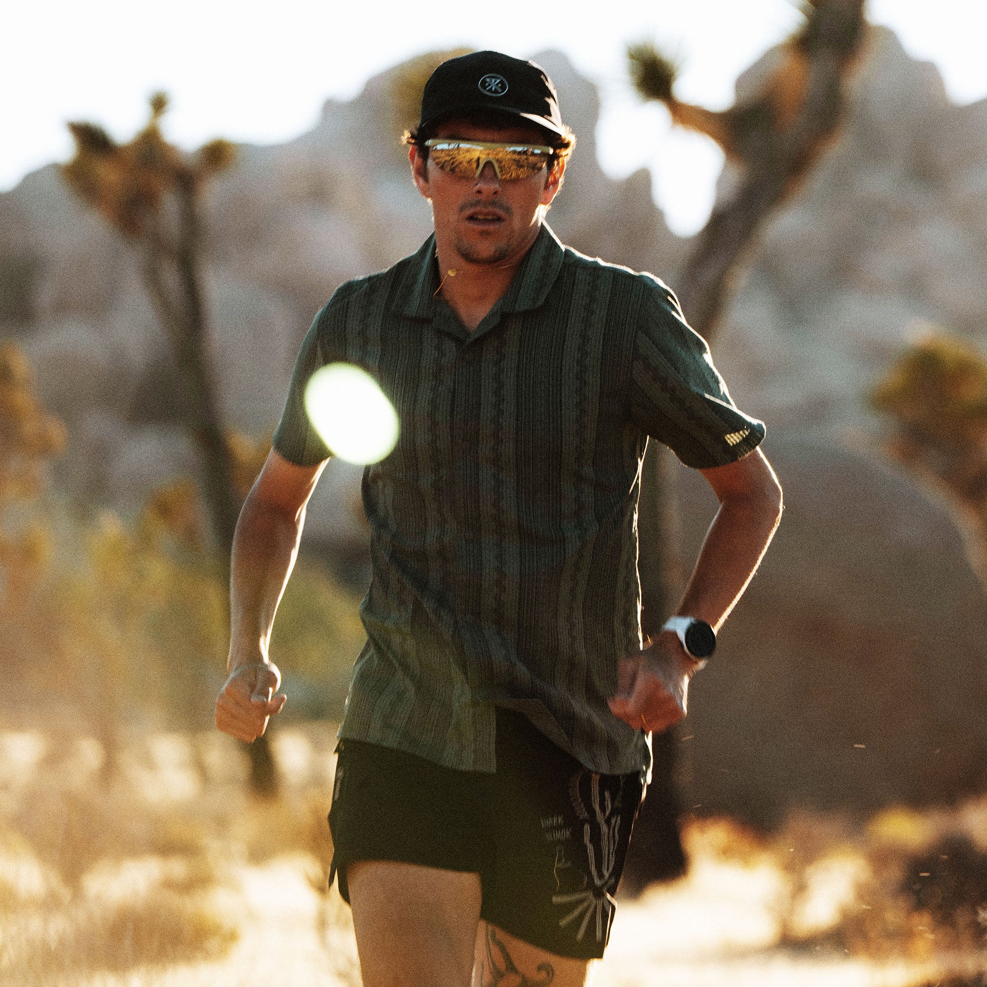 Bless Up Trail Button Up Shirt, worn by a trail runner among Joshua trees