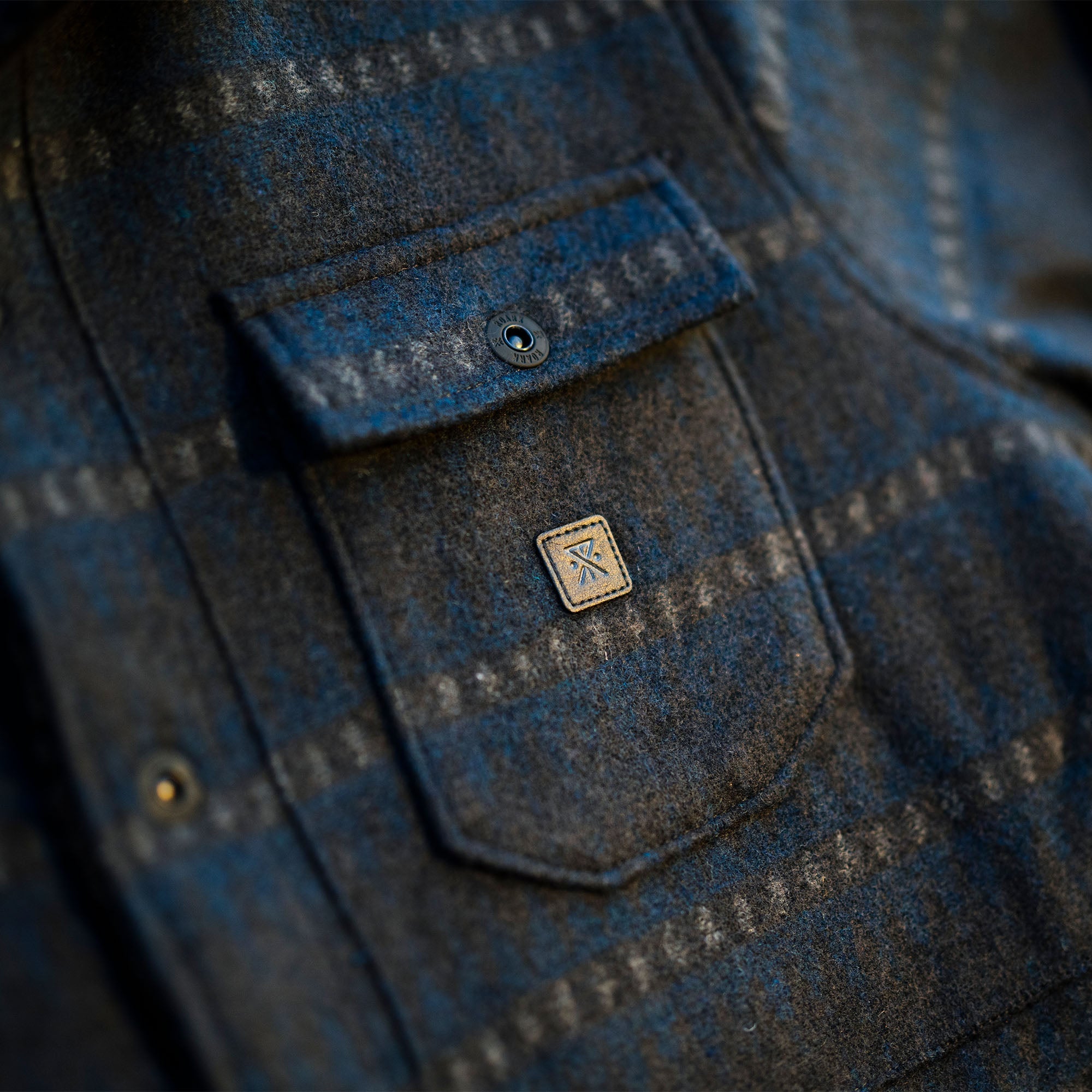 Roark Hebrides Jacket FA25 exploring rugged coastline, embodying adventure and durability