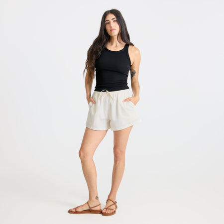 Active Bermuda-style shorts featured in a dynamic setting, emphasizing the versatility and comfort ideal for adventure and travel.